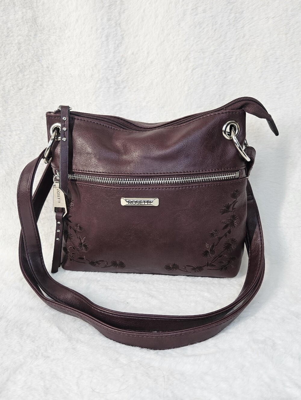 Rosetti Burgundy Crossbody Bag with Floral Embossing